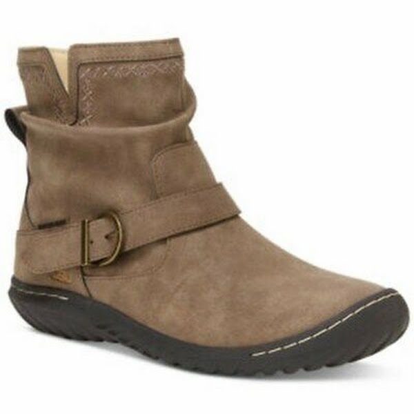 Brown ankle boot with a buckle on a white background