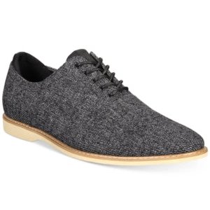 Gray textured dress shoe on a white background
