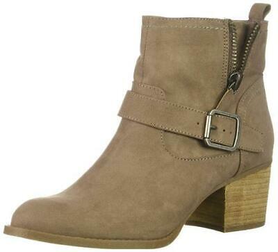 Tan ankle boot with a buckle on a white background