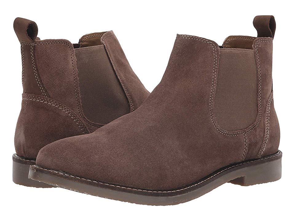 Pair of brown suede Chelsea boots on a white background