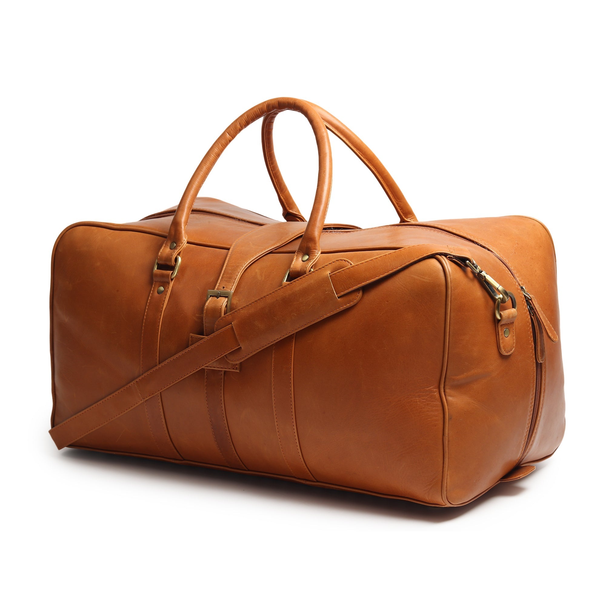 Brown leather duffel bag with gold hardware on a white background