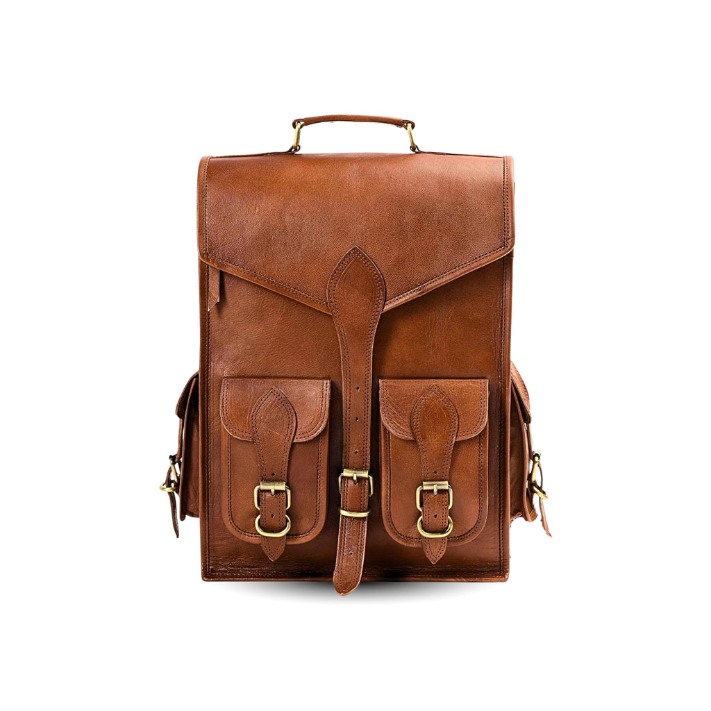 Brown leather backpack with gold buckles on a white background
