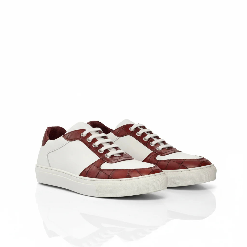 White and red sneakers on a white background